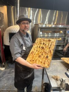 Chef Matt Miller learning Roman style pizza dough at Pizza University in Maryland.
